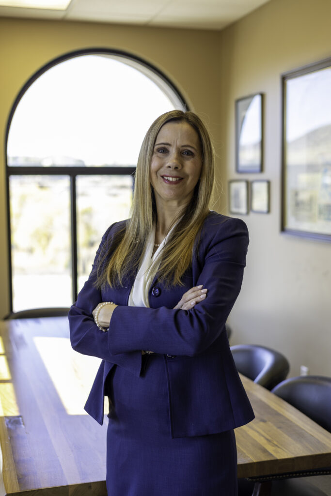 Attorney Caroline C. Cooley standing in Fourth Street Law conference room